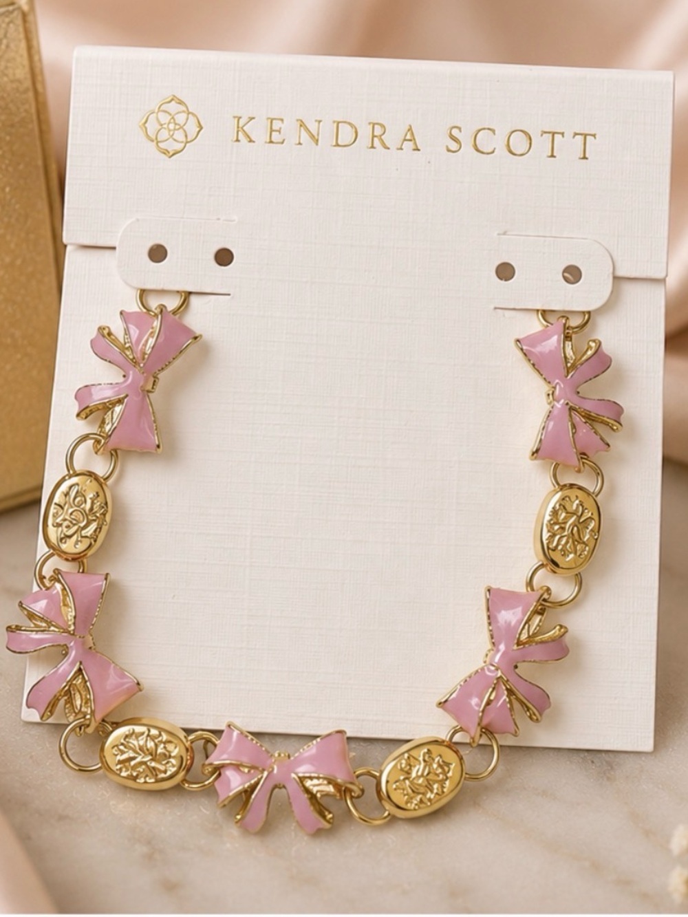 Kendra Scott Pink Enamel Bow and Medallion Necklace